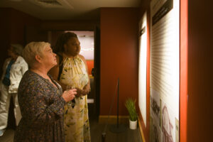Guests viewing the Horace Brazelton exhibit during the opening reception.