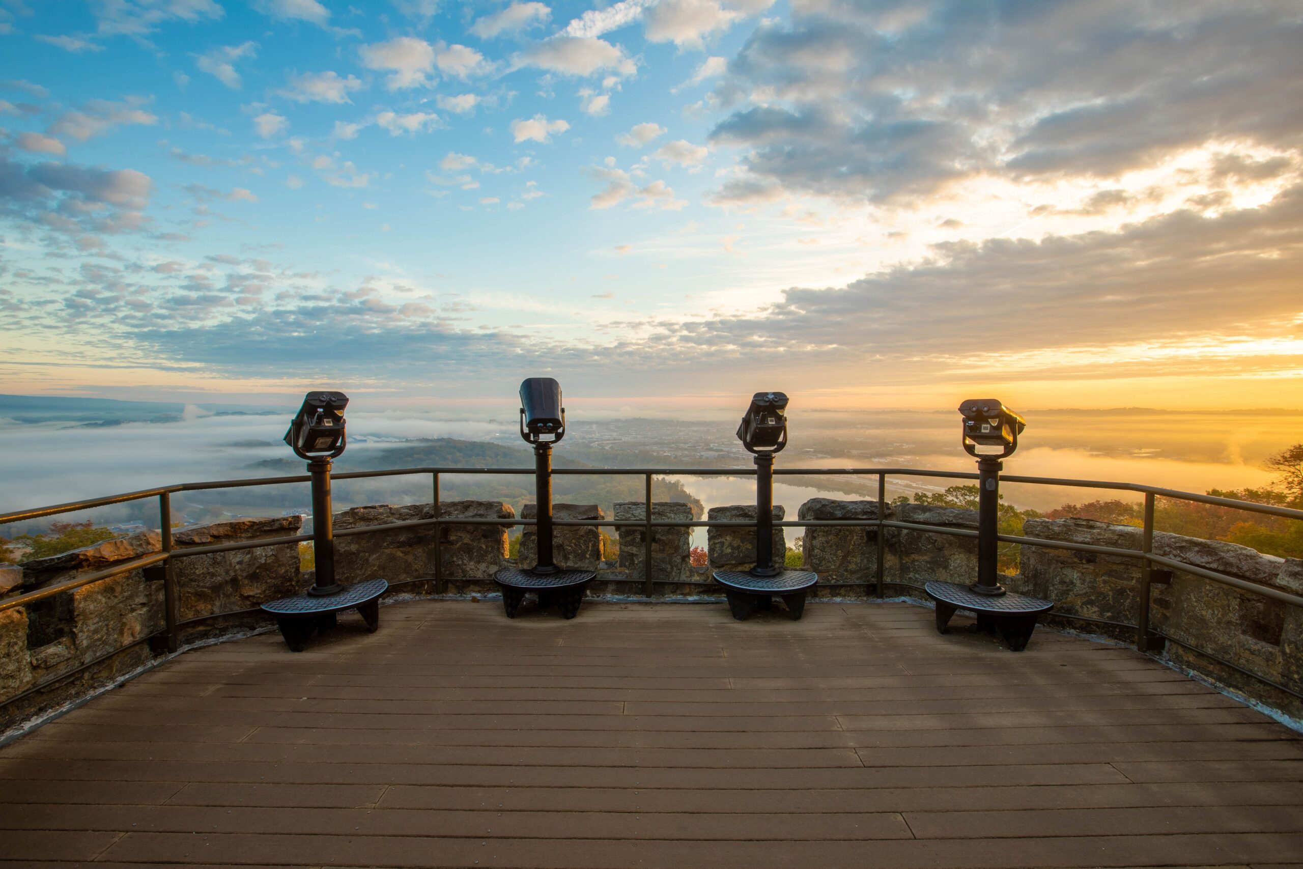 Four lookout stations viewing a misty scenic Chattanooga