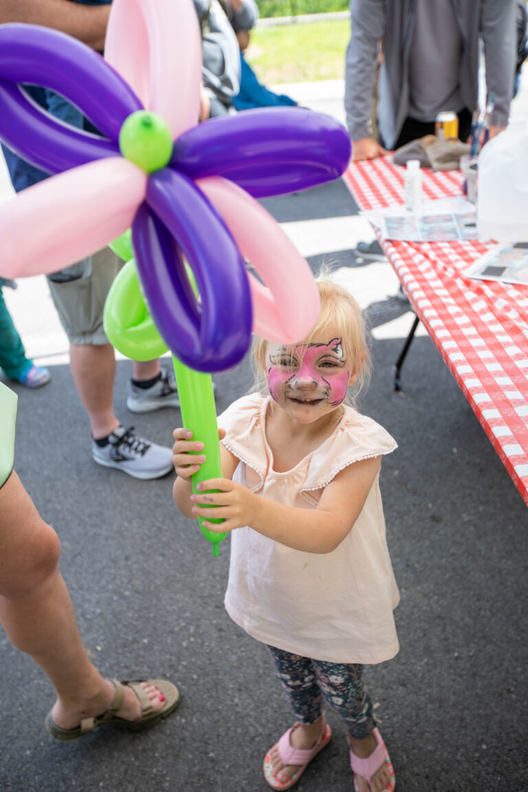 Small child with balloon art