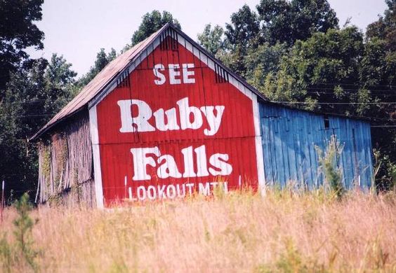 Red barn with See Ruby Falls painted on it