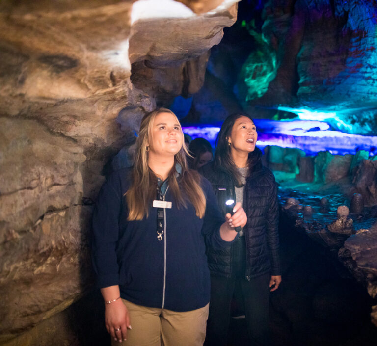Tour guide leading a tour at Ruby Falls