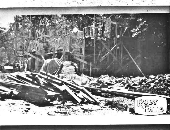 Black and white photo of the construction of the Ruby Falls Castle