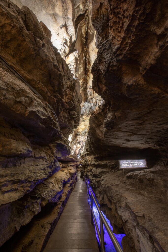 Cavern trail at Ruby Falls is surrounded by soaring limestone and ancient geological formations.
